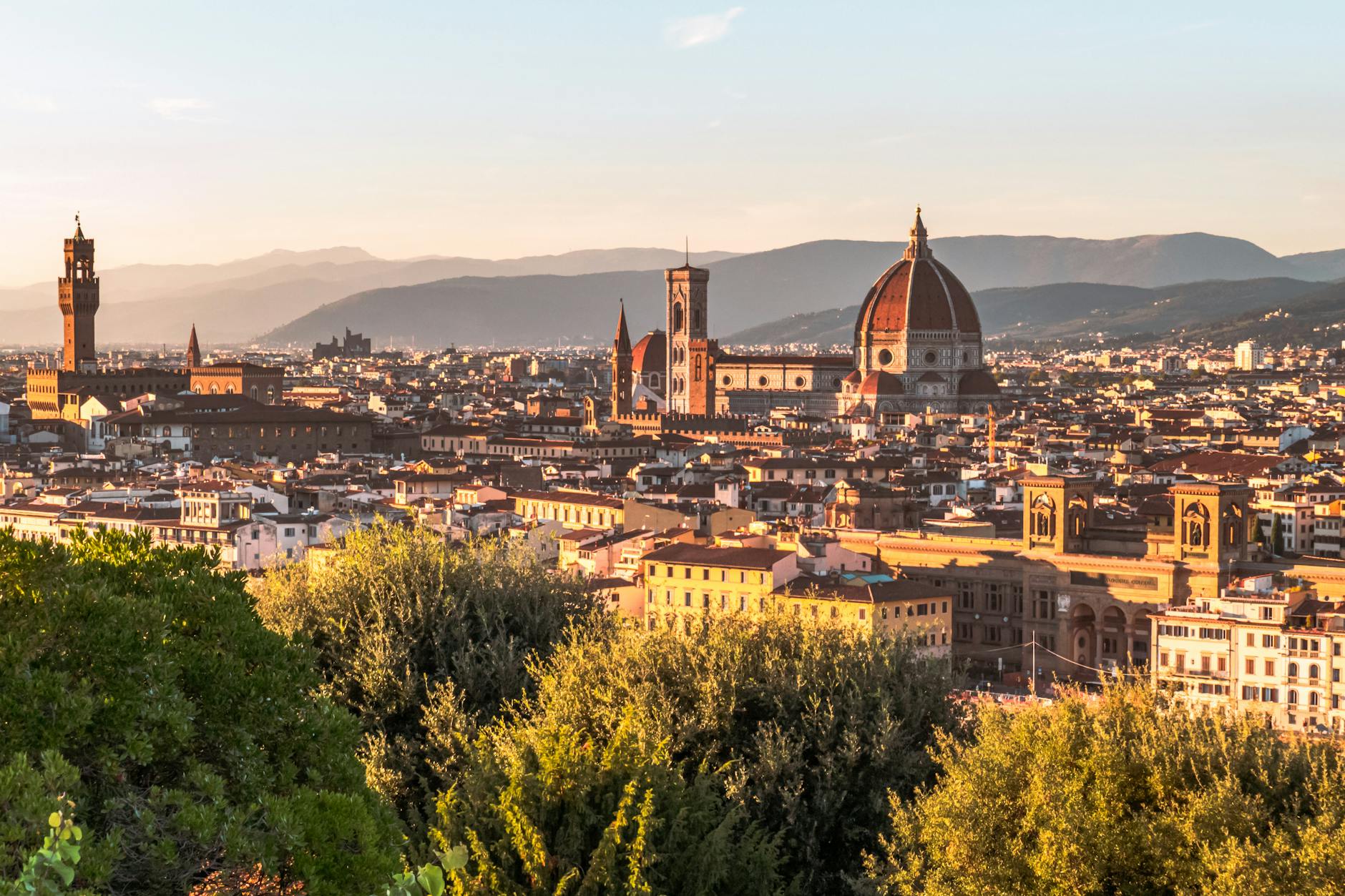 Breathtaking sunset over Florence, showcasing the Duomo and Tuscan landscape.